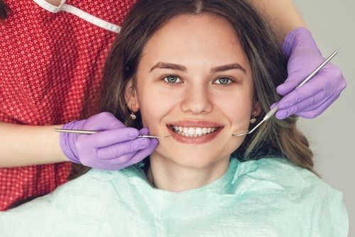 woman smiling at dental office